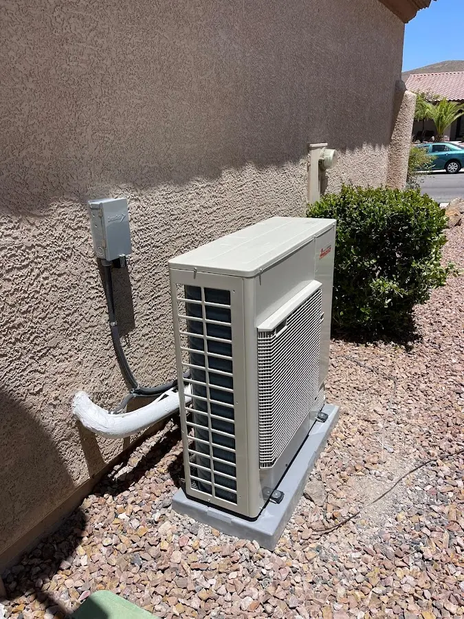 Residential air conditioning condenser unit in Lowell